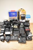 A large collection of various flashguns approx 20