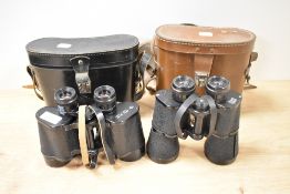 Two pairs of binoculars. A pair of Denhill Volksglas (AF) and a pair of Russian made 12x40 both in