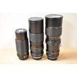 Three Vivitar lenses. An Auto Zoon 1:4,5 75-260mm, a Close Focusing Auto Zoom 1:5 100-300mm and a MC