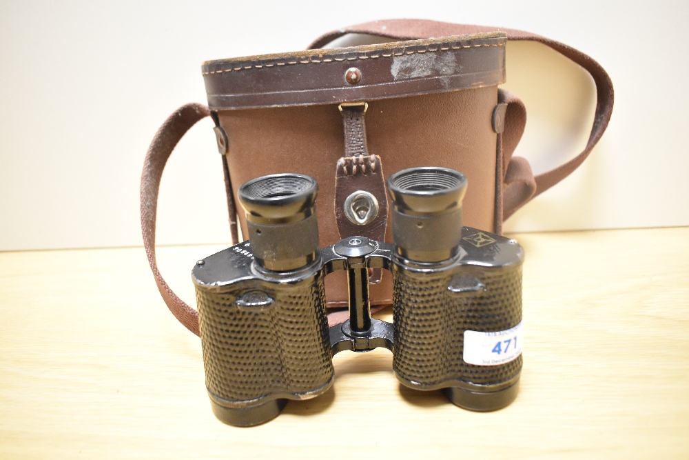 A Pair of 6x 30 binoculars in leather case
