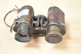 A Pair of CP Goertz 6X binoculars (damage to one eye piece) Engraved W M Mann XIX Regt