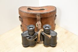 A pair of W Watson & Sons London Prismatic No3 X6 binoculars bearing the military crowsfoot mark