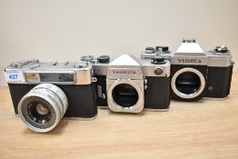 Four Yashica TL-Electro camera bodies Nos 40702803, 40401276, 31204659 & 60104330 one in original