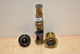 Two brass lenses one marked Lancaster Time 8 and a brass Microscope (As Found)