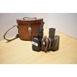 A pair of Taylor Hobson Bino Prism No2 Mk3 X6 binoculars No305129 (1943) in leather case with