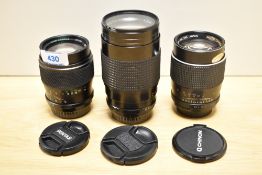 Three Chinon lenses. A MC 1:2,8 135mm, an Auto 1:2,8 135mm and an Auto MC 1:3,5 200mm