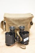 A pair of SS Super binoculars bearing military crowsfoot mark in webbing case