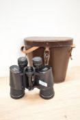A pair of Asahi Pentax 10 x 50 binoculars in cowhide case