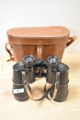 A pair of Wray Eleven 11 x 60 binoculars in leather case