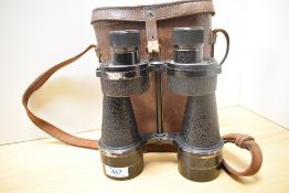 A pair of 7x50 binoculars in Prismatic No5 MkIII case