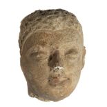 A GANDARA STUCCO HEAD OF BUDDHA, NORTH-WESTERN PAKISTAN, 4TH/5TH CENTURY