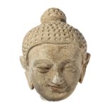 A GANDHARA STUCCO HEAD OF BUDDHA, NORTH-WESTERN PAKISTAN, 4TH/5TH CENTURY