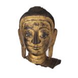 A FRAGMENTARY HEAD OF BUDDHA, BURMA, 19TH CENTURY