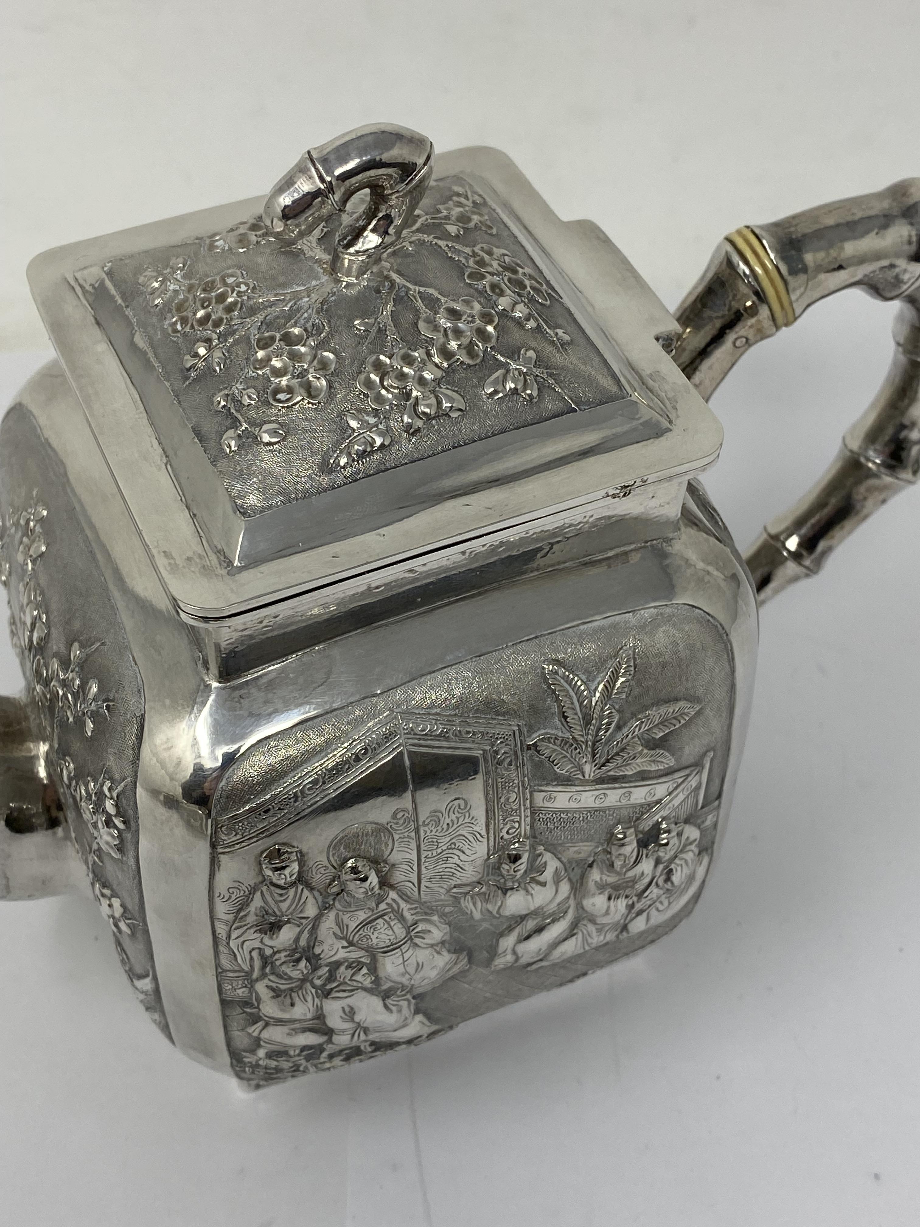 ˜A CHINESE SILVER MATCHED THREE-PIECE TEA SET, WANG HING, CANTON AND HONG KONG,CIRCA 1890 - Image 9 of 13