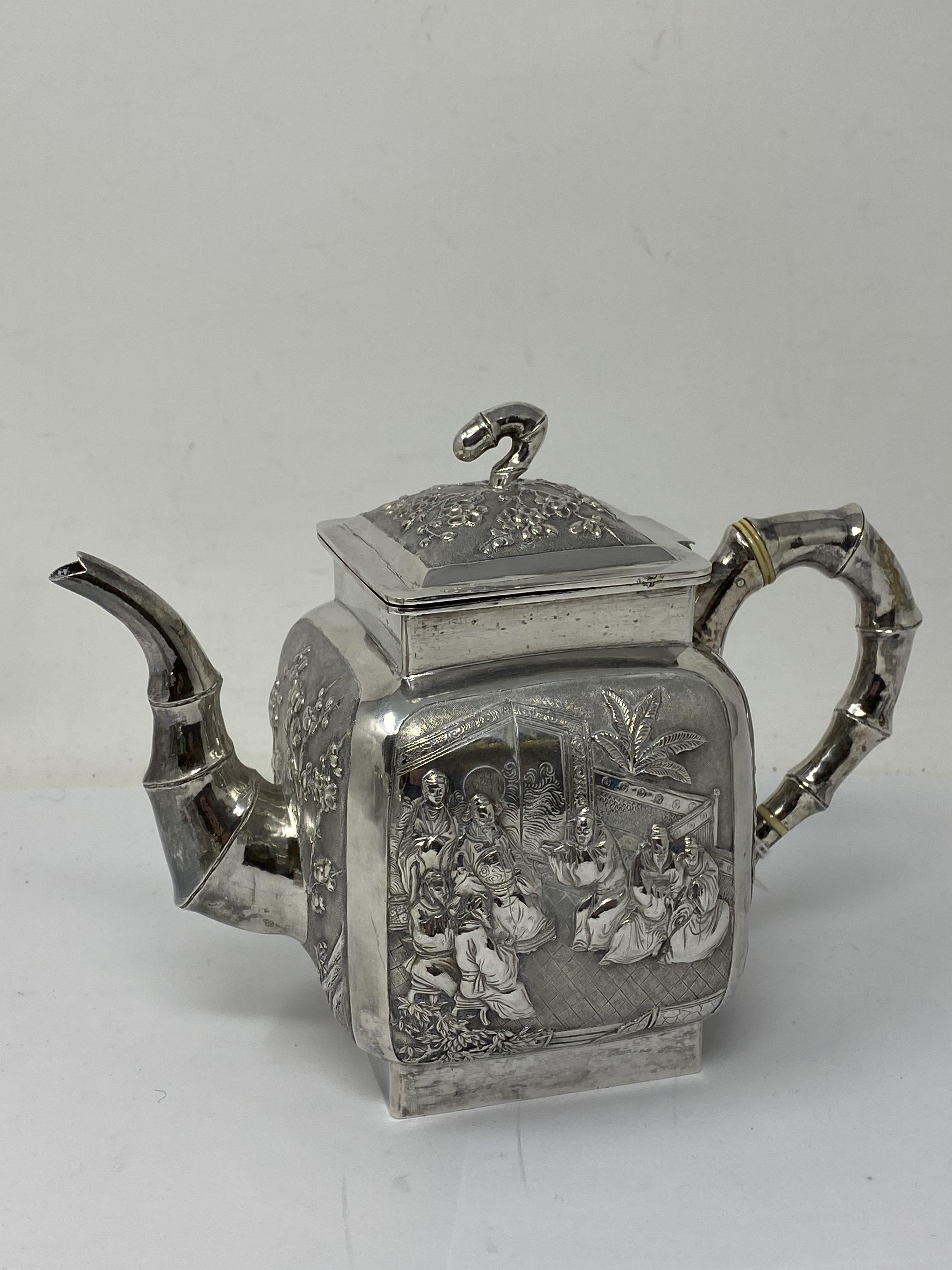 ˜A CHINESE SILVER MATCHED THREE-PIECE TEA SET, WANG HING, CANTON AND HONG KONG,CIRCA 1890 - Image 8 of 13