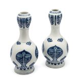 A PAIR OF CHINESE BLUE AND WHITE ARCHAISTIC BOTTLE VASES, 19TH CENTURY