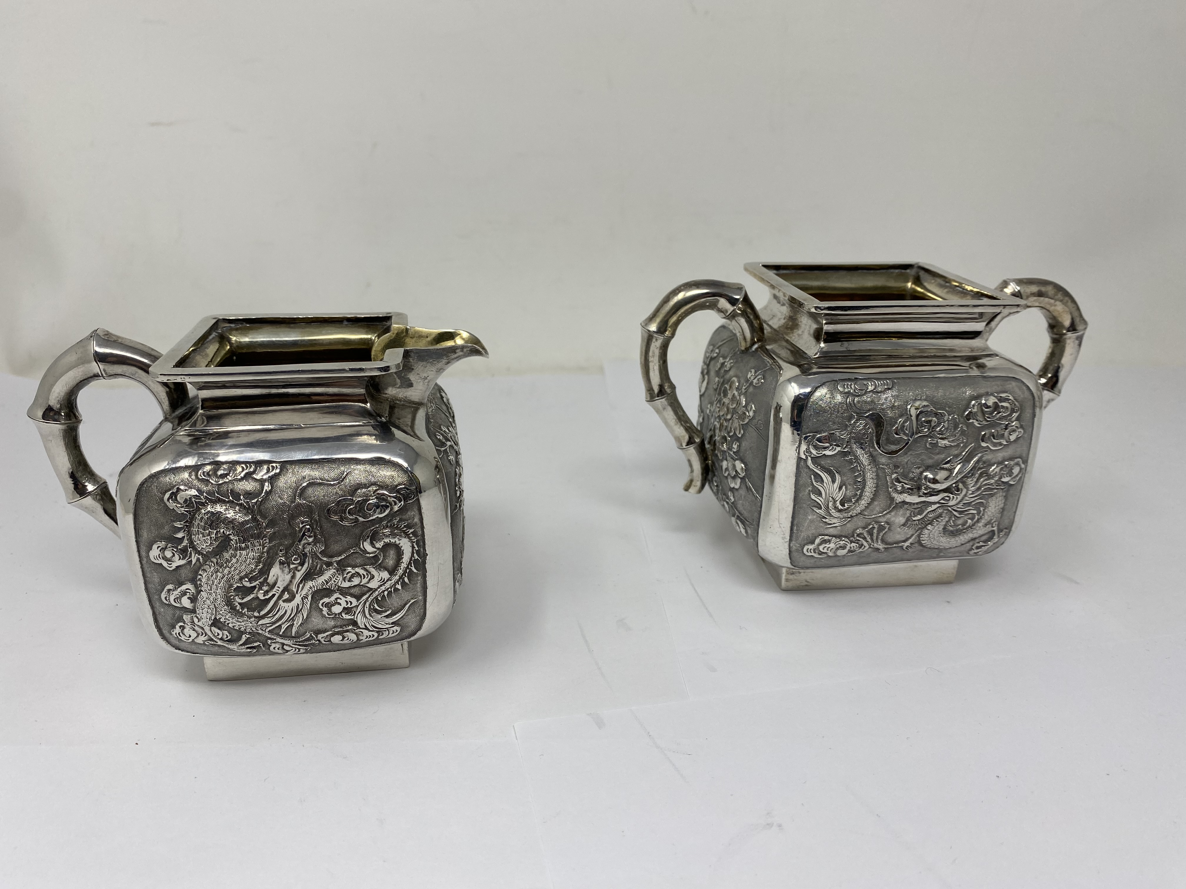 ˜A CHINESE SILVER MATCHED THREE-PIECE TEA SET, WANG HING, CANTON AND HONG KONG,CIRCA 1890 - Image 3 of 13