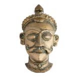 A BRASS SIVA MASK, WESTERN DECCAN, INDIA, 18TH/19TH CENTURY