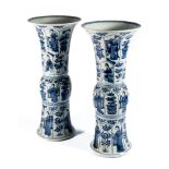 A PAIR OF CHINESE BLUE AND WHITE BEAKER VASES, ‘GU’, KANGXI PERIOD (1662-1722)