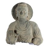 A GANDHARA GREY SCHIST BUST OF BUDDHA, NORTH-WESTERN PAKISTAN, 3RD/4TH CENTURY