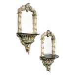 A PAIR OF GERMAN PORCELAIN MIRRORED WALL SCONCES, LATE 19TH CENTURY