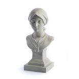 A SEVRES BISCUIT BUST OF 'LA PAYSANNE', 1913