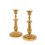 A PAIR OF GILT-BRONZE CANDLESTICKS, PROBABLY FRENCH SECOND QUARTER 19TH CENTURY