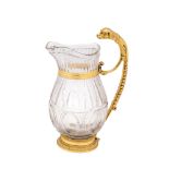 AN ORMOLU-MOUNTED CUT-GLASS JUG, FRENCH, EARLY 19TH CENTURY