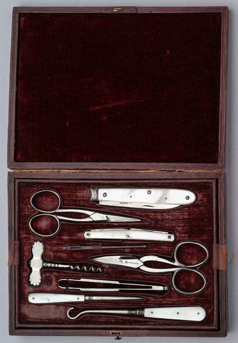 A MOTHER-OF-PEARL MOUNTED MANICURE SET, MACDANIEL, OXFORD STREET, EARLY 20TH CENTURY AND A CASED