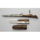 A HUNTING LOCK KNIFE AND A COMBINED KNIFE AND FORK SET, SECOND HALF OF THE 19TH CENTURY