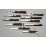 FIVE LOCK KNIVES BY LOCKWOOD BROTHERS, SHEFFIELD, LATE 19TH CENTURY, A FIGHTING KNIFE AND THREE