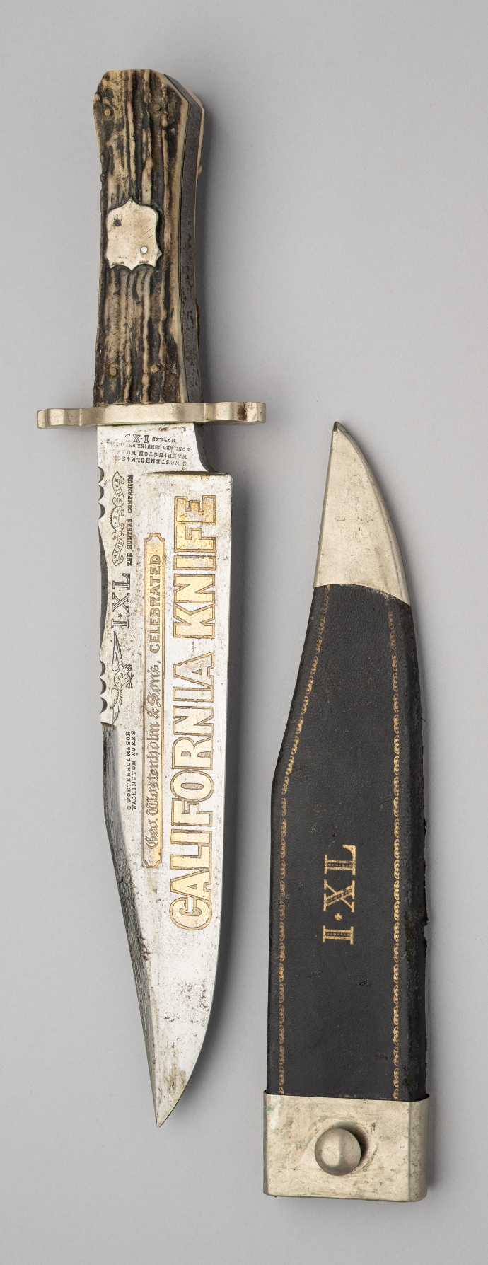 A BOWIE KNIFE, GEORGE WOSTENHOLM & SON, WASHINGTON WORKS, SHEFFIELD, CIRCA 1960