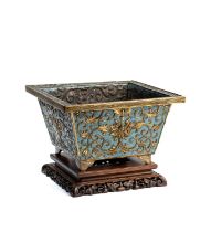 A CHINESE GILT-COPPER AND CHAMPLEVE ENAMEL JARDINIERE, QING DYNASTY (1644-1911)