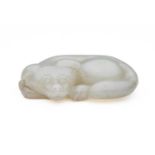A CHINESE CELADON-WHITE JADE DOG, QING DYNASTY (1644-1911)