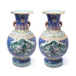 A LARGE AND FINELY ENAMELLED PAIR OF CHINESE FAMILLE-ROSE BALUSTER VASES, QING DYNASTY, 19TH