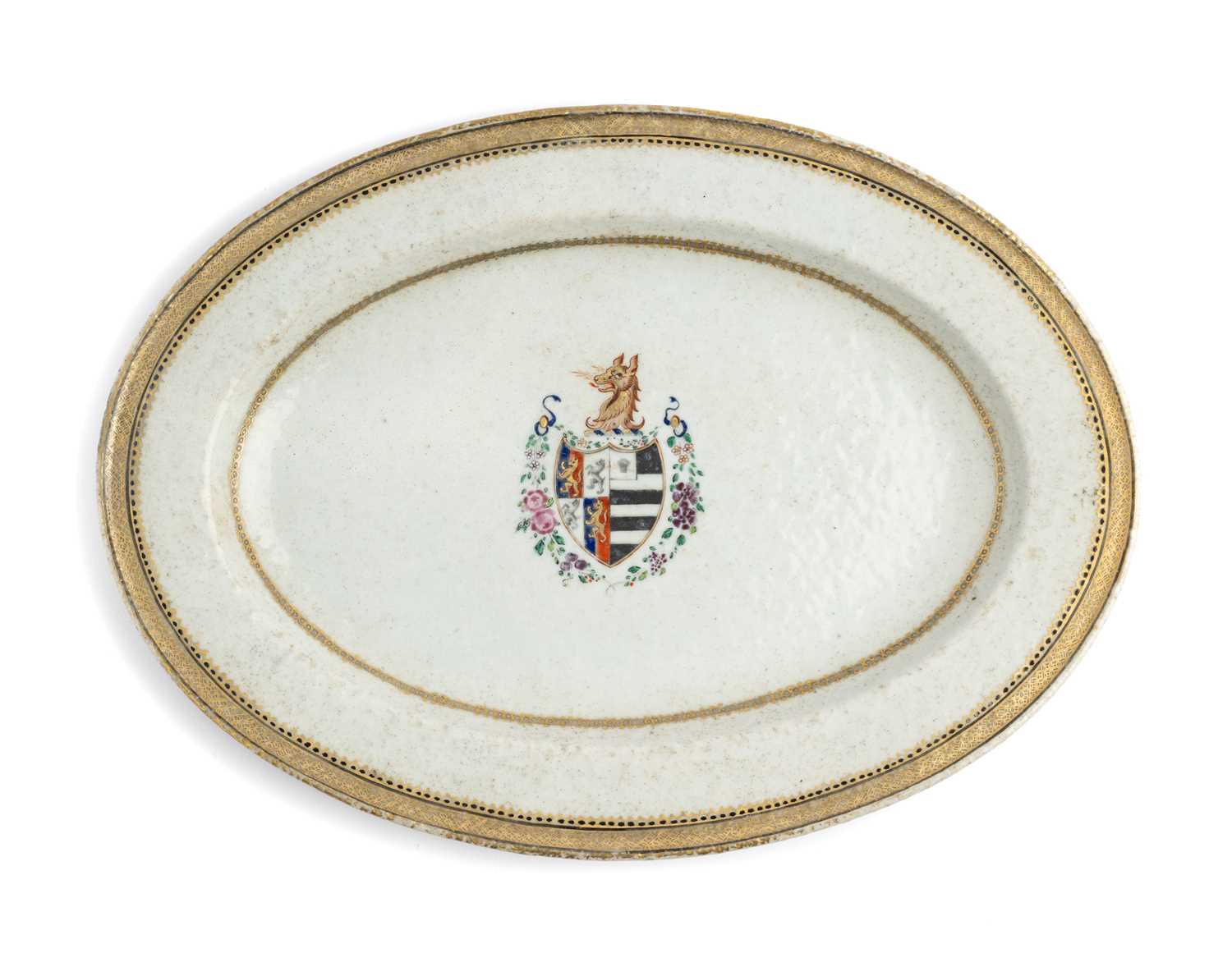 A CHINESE EXPORT ARMORIAL OVAL SERVING DISH, QIANLONG PERIOD, CIRCA 1785