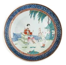 A LARGE CHINESE FAMILLE-ROSE RETICULATED DISH, QING DYNASTY, QIANLONG PERIOD (1736-95)