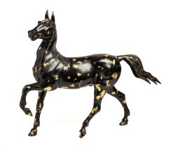 A CHINESE GOLD-SPLASHED BRONZE PRANCING HORSE, 20TH CENTURY