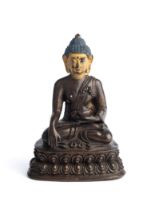 A BRONZE FIGURE OF BUDDHA, TIBET, 16TH/17TH CENTURY