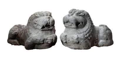 A PAIR OF CARVED GRANITE LIONS, TAMIL NADU, SOUTH INDIA, CIRCA 12TH CENTURY