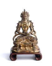 A SINO-TIBETAN GILT-BRONZE FIGURE OF AMITAYUS, 18TH CENTURY