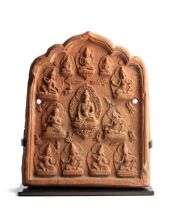 A BUDDHIST DEVOTIONAL RELIEF PLAQUE (TSA-TSA), TIBET, PROBABLY 17TH/18TH CENTURY