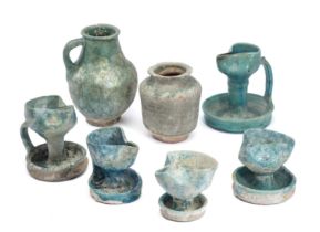 EIGHT KASHAN TURQUOISE GLAZED POTTERY VESSELS, PERSIA, CIRCA 12TH CENTURY