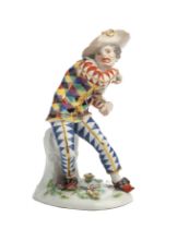 A MEISSEN FIGURE OF THE FRIGHTENED HARLEQUIN, 20TH CENTURY