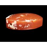 A GREEK RED AGATE SCARABOID SEAL.