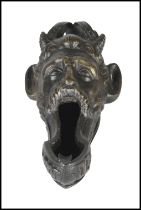 Satyr's head shaped lantern