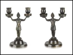 Two Knight-form candlesticks