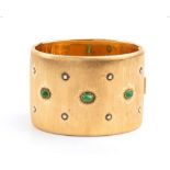 MARIO BUCCELLATI: vintage gold bangle bracelet with emeralds and diamonds.