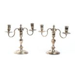A pair of English sterling silver candelabra - London 1956