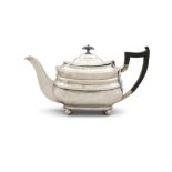A SILVER TEAPOT Sheffield c.1931, mark of James Dixon & Sons ltd, of oval panelled form,
